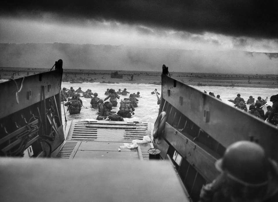 U.S. Troops wading through water and Nazi gunfire