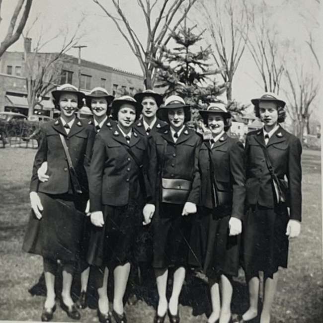 Verna Heinrich (left) with fellow WAVES